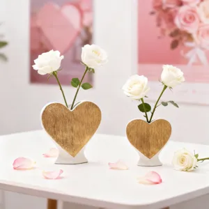 Heart-shaped ceramic vase set with gold finish for romantic home decor and flower arrangement