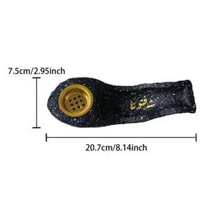 Resin flat boat incense burner with Arabic calligraphy, black speckled finish and gold bowl.