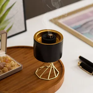 Modern Nordic ceramic incense burner with gold metal stand for home and table decor