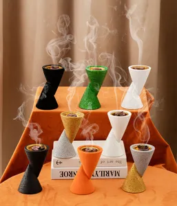 Double-cone resin incense burner with metal tray and smoke effect, creative home decor.
