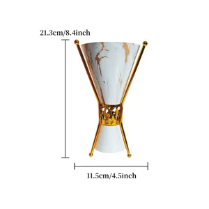 Elegant middle eastern style incense burner with gold metal stand and white marble pattern design.