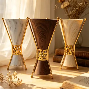 Luxury Middle Eastern metal incense burner with elegant hourglass design and stand.