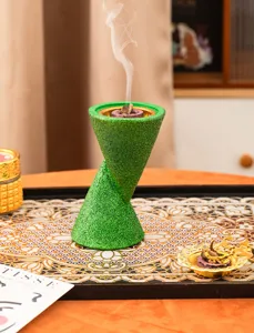 Close-up detail of the green glitter double cone resin incense burner for Arabic home decor.