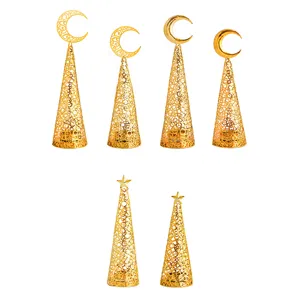 Gold hollow metal cone candle holders featuring moon and star designs for home decor.