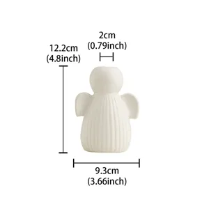 Detail view of white ceramic angel vase with dimensions, desktop home decor ornament.