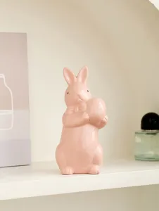 Ceramic easter bunny figurine holding egg detail pink desktop homeware decor ornament piece