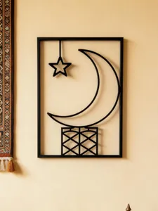 Exquisite black metal wall art featuring crescent moon and star design for elegant home decor.