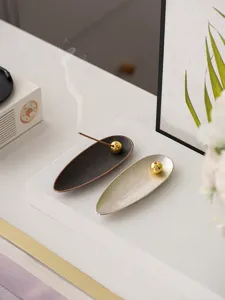 Modern creative leaf incense holder set with golden bead for desktop home decor display.
