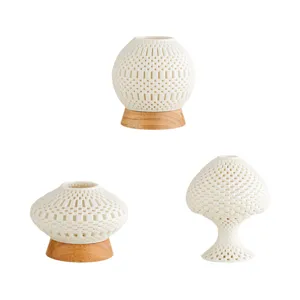 3D printed hollow ceramic candle holder set, minimalist white table art home decoration detail