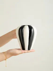 Nordic minimalist black and white ceramic vase, glossy striped flower vase for home decor.