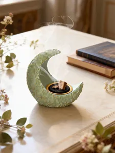 Detailed close-up of the Arabic crescent resin incense burner showcasing exquisite design features.