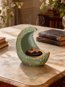Arabic crescent resin incense burner with exquisite Middle Eastern style design for home decor.