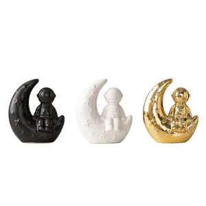 Modern creative astronaut moon ceramic ornament set for home desktop bookshelf decor.