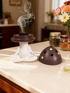 Detailed view of cute meditation mushroom incense burner showing delicate ceramic craft