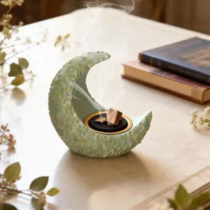 Arabic crescent resin incense burner for stylish home aromatherapy and chic table decor.