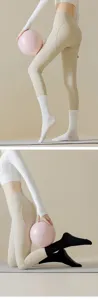 Detailed view of women non-slip pilates yoga socks in mid-tube design with silicone grip.