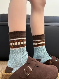 Detailed view of retro floral wool mid-calf socks showcasing cozy knit texture and style.