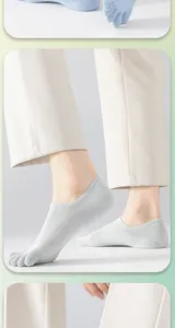 Detail view of men's breathable mesh five-toe low-cut socks, showing toe separation fit.