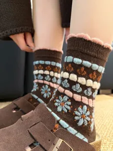 Close-up detail of retro floral wool blend mid-calf socks with cozy knit texture.