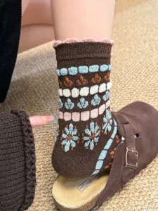 Retro wool blend knit mid-tube socks with floral pattern and cute ruffles for women.