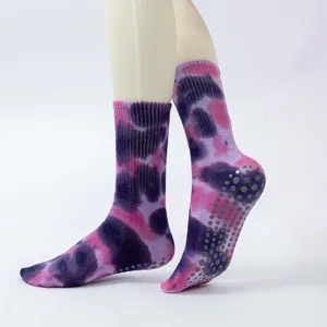 Colorful tie-dye yoga socks with non-slip grip soles for Pilates and indoor fitness wear.