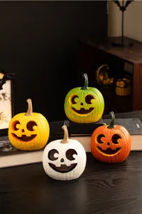 Halloween resin carved pumpkin ornaments set, colorful tabletop home decor for harvest festival.
