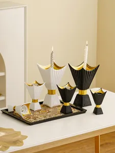 Middle Eastern style resin candle holder set with gold accent for home tabletop decor.