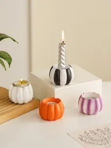 Resin pumpkin candle holder detailed view, perfect for Halloween and autumn table decor styling.
