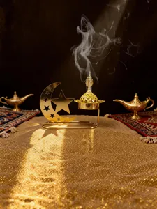 Golden hollow star moon incense burner detail showcasing exquisite Middle Eastern arabic decor style