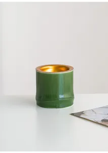 Bruciatore di incenso in ceramica moderna, design in bambù verde con interno dorato per la casa.