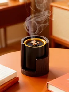 Modern Middle Eastern incense burner with bark texture and black gold cup for home decor.