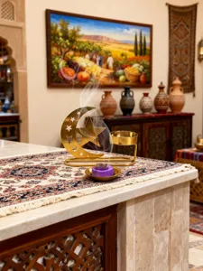 Middle Eastern golden hollow star and moon incense burner home decor with aroma tray.