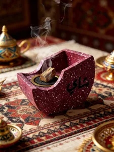 Creative resin boat-shaped incense burner with Arabic calligraphy for modern home decor.