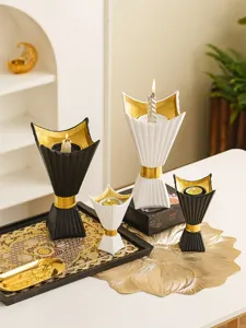 Exquisite Middle Eastern style candle holder set, elegant black and white decor detail.