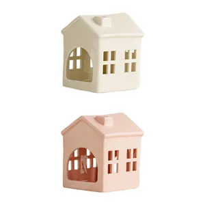 Ceramic hollow house candle holder set, modern minimalist home decor and table ornament.