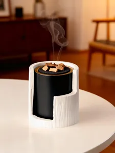 Modern Middle Eastern electric incense burner with white bark texture and black body detail.