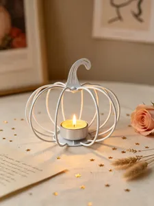 White iron pumpkin candle holder for table decor, romantic autumn home ornament and party display.