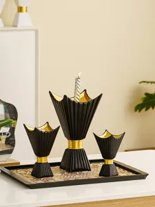 Black gold candle holder set middle eastern arabic style desk decor detail view.