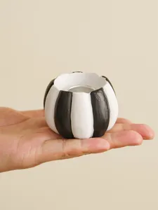Halloween black and white striped resin pumpkin candle holder tabletop home decor ornament.