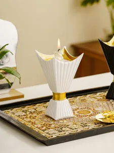 Middle Eastern white gold candle holder detail showcasing elegant vertical stripes design.
