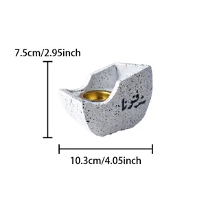 Resin boat-shaped incense burner with Arabic calligraphy and golden cup for home decor.