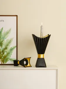 Middle Eastern style black and gold horn chalice candle holder for home decor detail view.