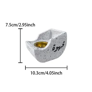 Creative resin boat shaped incense burner with Arabic calligraphy, unique home decor piece.