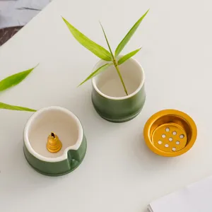 Bruciatore di incenso in ceramica verde design bambù creativo per decorazione desktop e meditazione.