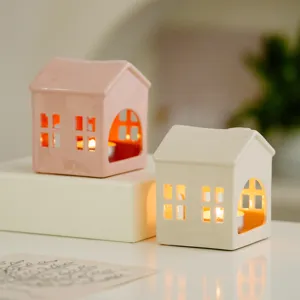 Ceramic house tea light candle holder set, hollow warm lighting home decor for holiday wedding.