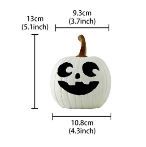 White resin Halloween pumpkin figurine with carved facial expression for festive tabletop decor.