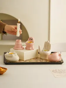 Cute ceramic candle holder set, creative ghost and hand tea light stand for home table decor.
