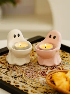 Cute ceramic ghost candle holder, creative tea light cup for home decor and cozy lighting.