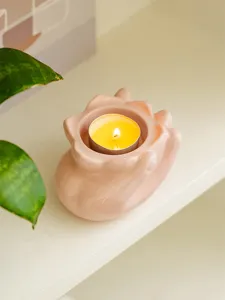 Pink ceramic tealight candle holder, cute home decor desktop candle cup for cozy ambiance.