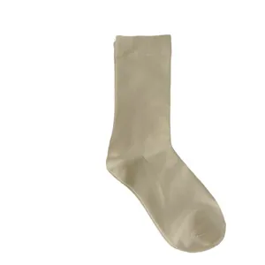 Beige long socks for women, comfortable stretchy knit spring hosiery for daily wear.